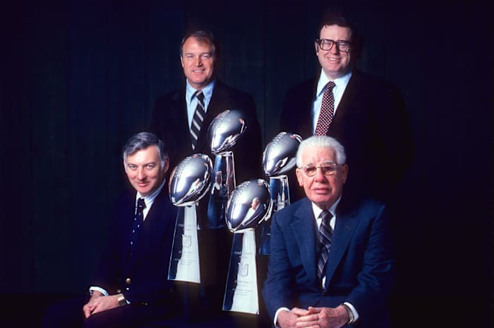 A 1982 portrait of Steelers front office (l. to r.) team president Dan Rooney, coach Chuck Noll, team vice president Art Rooney Jr., and owner and chairman Art Rooney Sr. (John G. Zimmerman/SI)